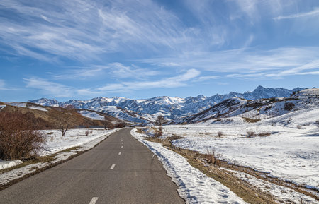 Rocky mountains in the snow in spring. mountain landscape.の写真素材