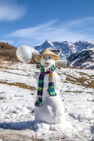 Scarf on a figure from snow in the nature in the winterの写真素材