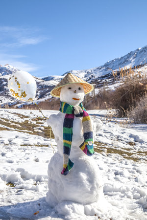 Scarf on a figure from snow in the nature in the winterの写真素材