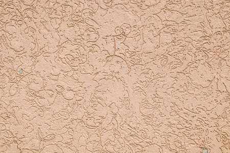 Old plastered wall close-up as a background.の写真素材