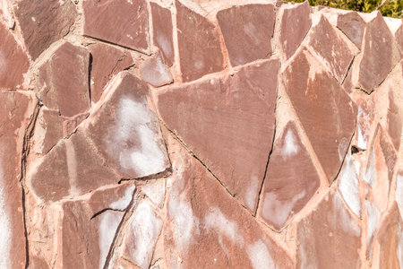 Retaining wall made of natural stone in the city parkの写真素材