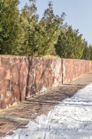 Retaining wall made of natural stone in the city parkの写真素材