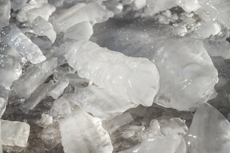 Melting blocks of ice in nature as a background.