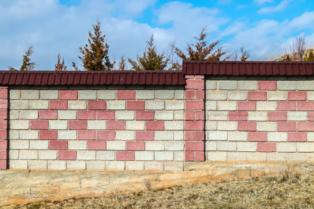 Beautiful blank vintage cinder block fence in nature in Kazakhstanの写真素材