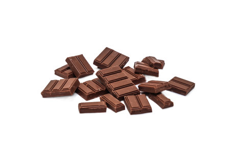 chocolate pieces on white backgroundの写真素材