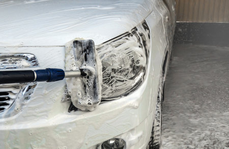 Soap foam on the car. Washingの写真素材