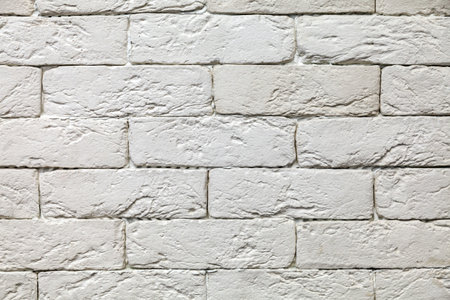 Brick wall painted white as backgroundの写真素材