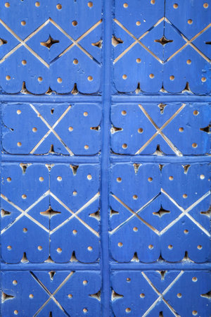 Painted blue gray mosaic brick tile wall, graffiti texture closeup, with bright colors for...