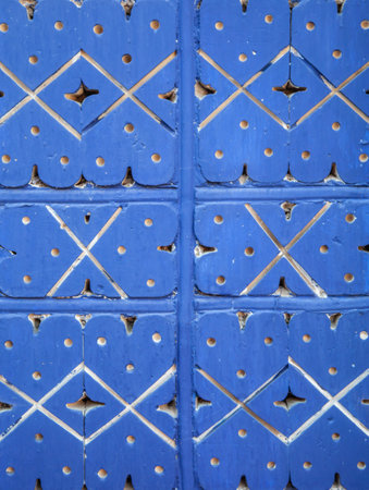 Painted blue gray mosaic brick tile wall, graffiti texture closeup, with bright colors for creativity, creative background and ideas.の写真素材