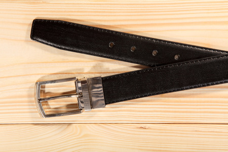 Stylish leather belt on tableの写真素材