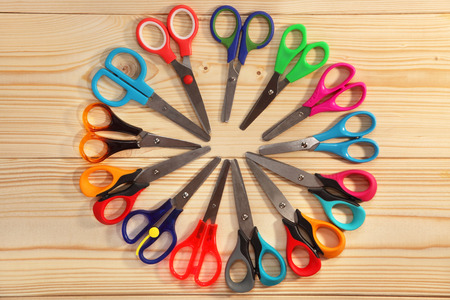 Bright scissors for kids on wooden backgroundの写真素材
