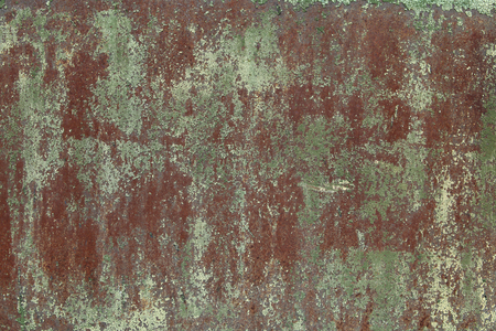 Old metal sheet, damaged by corrosion with spots of exfoliating, faded green paint. Background for your designの写真素材
