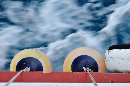 Buoy on body of moving ship  Waving adriatic sea in top part of image  Horizontal imageの写真素材