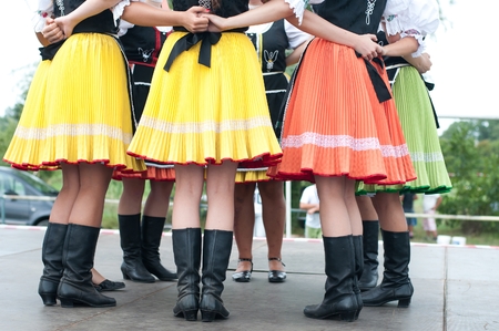 Fragment of Slovak folk dance with colorful clothes in Folk Festivalの写真素材