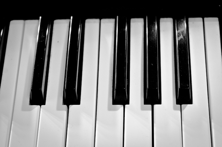 Close up of one octave of piano keyboardの写真素材