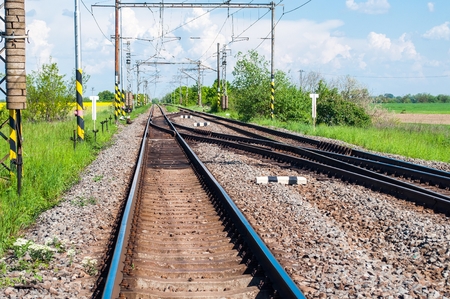 Railway tracks with railroad switch in a rural sceneの写真素材