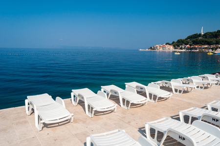 Adriatic sea at Podgora in Croatia with monument Seagull's wings in backgroundの写真素材
