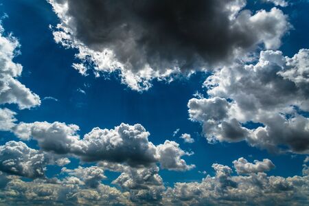 Blue sky background with white clouds の写真素材