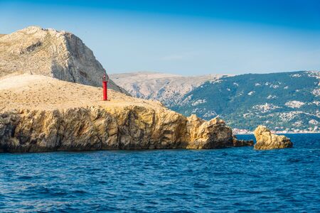 Lighthouse near the Baska town on the south side of the island Krk, Croatiaの写真素材