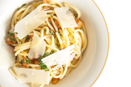 Traditional Italian pasta with tomatoes and parmesan cheeseの写真素材
