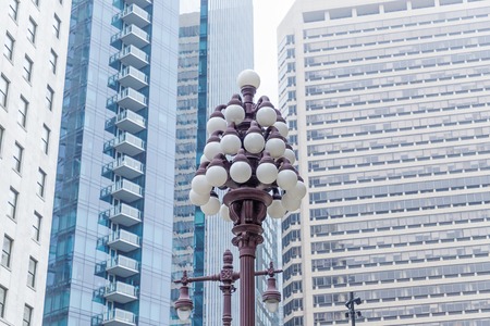 Street light and skyscrapers. Philadelphia, Pennsylvania, USAの写真素材