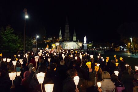 Lourdes, France. October 21 2017 Candle lights in the Mary Processionのeditorial素材