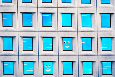 Blue glass window pattern. Funny windows with smiling face