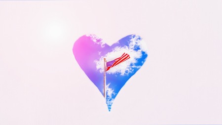 American flag on the blue sky background in heart. Pastel background, copy space. 16:9 panoramic formatの写真素材