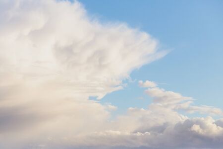 Beautiful sky with scenic white clouds. Copy space