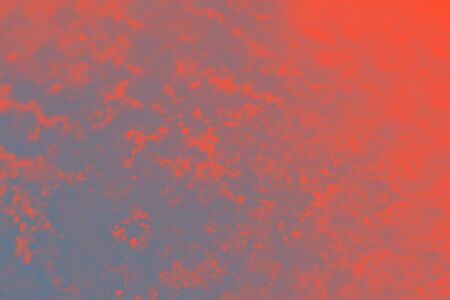 Bright red orange lush lava and gray gradient background. Metal iron pattern, patchy abstract backgroundの写真素材