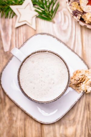 White cup of coffee cappuccino and homemade cookies. Top viewの写真素材