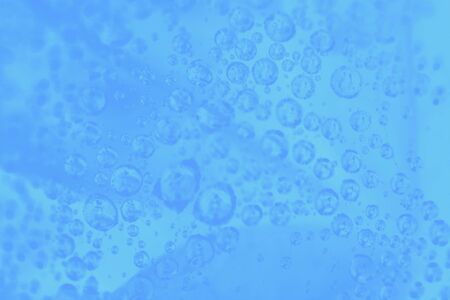 Pale blue gradient background with water drops pattern, abstract background