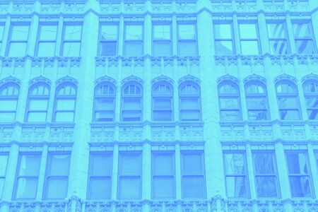 Beautiful windows. Details. Philadelphia city, state of Pennsylvania USA. Blue gradient toned