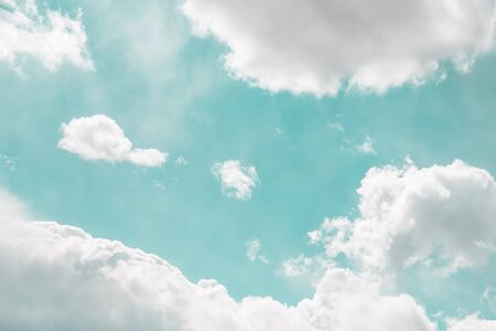 Light green mint soft sky with beautiful white clouds