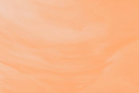 Orange pastel abstract background with paint brush strokes patternの写真素材