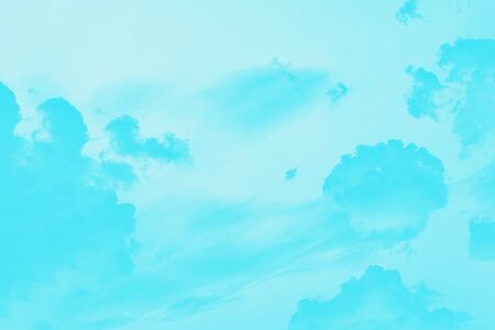 Abstract aquamarine aqua color gradient sky background with cloudsの写真素材