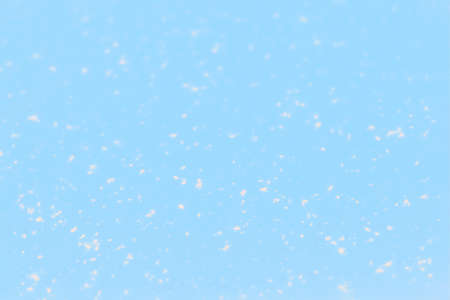 Light blue background with white dots pattern, spotted background