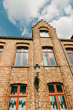 Details of facades old brick houses, vertical. Bruges, Belgiumの写真素材
