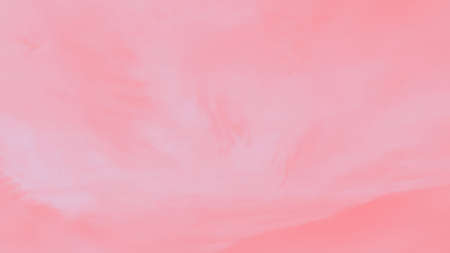 Beautiful sky with cirrocumulus clouds, pink coral watercolor toned, panoramaの写真素材