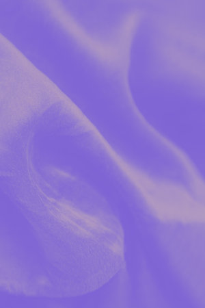 Violet purple lavender color silk soft wave fabric backgroundの写真素材