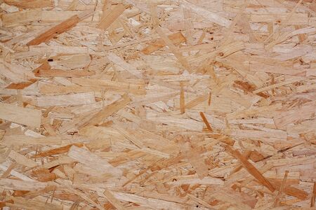 OSB plate texture. Hardboard wood texture. The structure of the pressed wood chipboard.の写真素材
