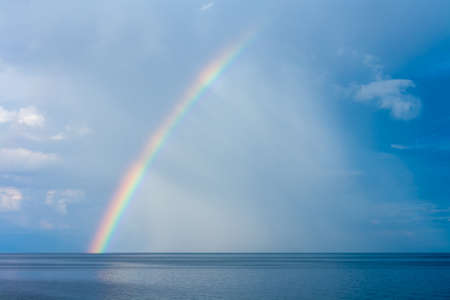 Rainbow over Lake Baikal. Horizontal image.の写真素材