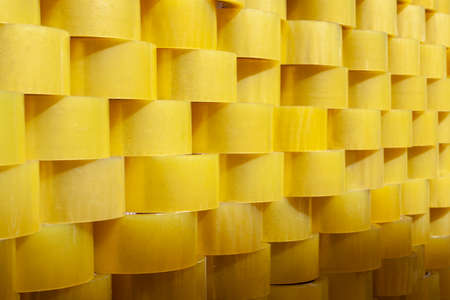 Wall of transparent yellow tape. Background from adhesive tape. horizontal photo.
