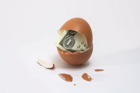 One dollar banknote hatching out and shell' flinders on light background
