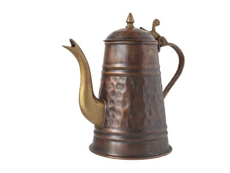 Old brazen coffee-pot standing on white backgroundの写真素材