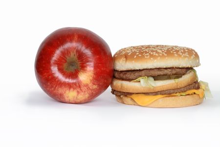 Red apple and hamburger isolated on white backgroundの写真素材