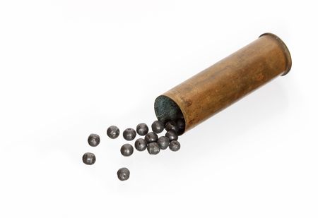 Old brass cartridge with buckshot isolated on white backgroundの写真素材