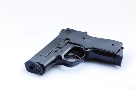 Black modern automatic pistol isolated on white with path