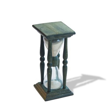 Old wooden hourglass isolated on white background