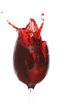 Goblet with splashing cherry juiceの写真素材